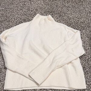 White turtle neck sweater
